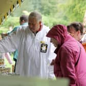 Mervyn Warrington of Killinchy Beekeepers Association with Catherine Rafferty and Ann Hodginton.

Picture: Philip Magowan/Press Eye