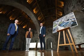 From left: Dermot MacRandal from the Department for Communities, Historic Environment Division, Andrew Bryce from Alastair Coey Architects and Ciaran Fox from RSUA celebrate winning an RSUA Design Award for the Carrickfergus Castle roof replacement project