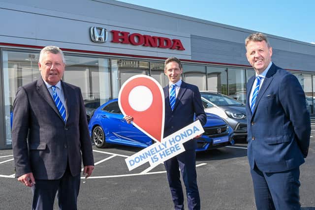 Terence Donnelly, executive chairman of the Donnelly Group, Paul Compton, site director and Dave Sheeran, managing director of Donnelly Group, mark the opening of the new Donnelly Honda showroom on the Boucher Road