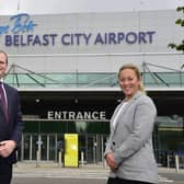 Economy Minister Gordon Lyons with Katy Best, commercial director, George Best Belfast Airport