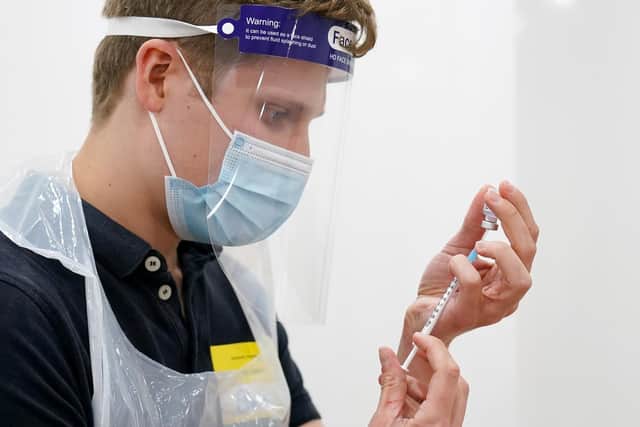 Medical staff prepare a coronavirus vaccination