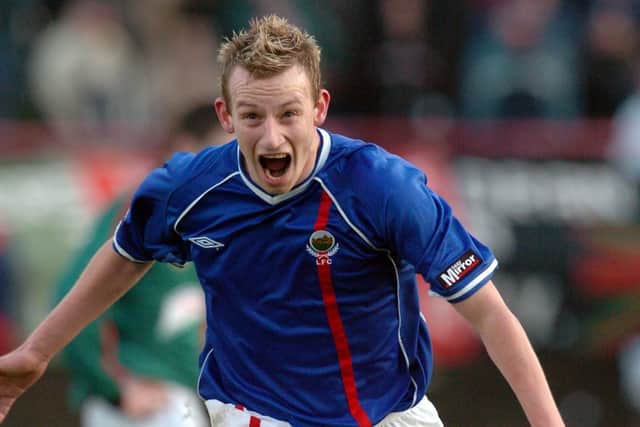 Stuart King - celebrating back in 2003 during a playing career at Linfield - will make his first top-flight appearance as manager today with Carrick Rangers. Pic by Pacemaker