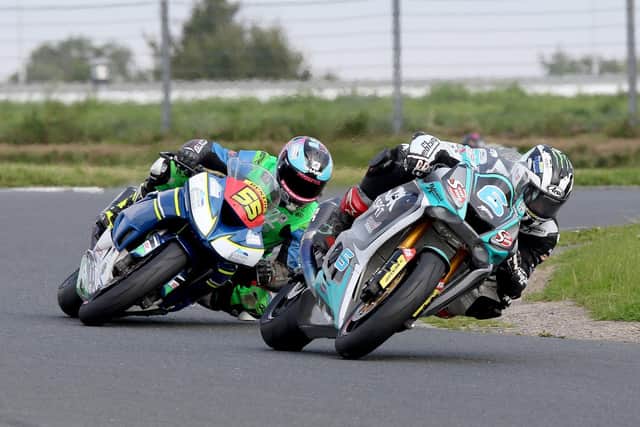 Michael Dunlop leads Kevin Keyes in the Supersport class at the Dunlop Masters Superbike meeting at Mondello Park in Co Kildare. Picture: Derek Wilson.