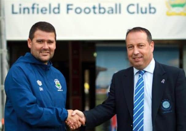 David Healy with Blues chairman Roy McGivern. PICTURE: Linfield FC