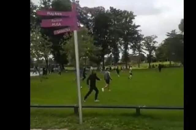 Portadown's People's Park was the scene of a mass brawl on Sunday during which one man was stabbed. Screenshot from a video of the incident.