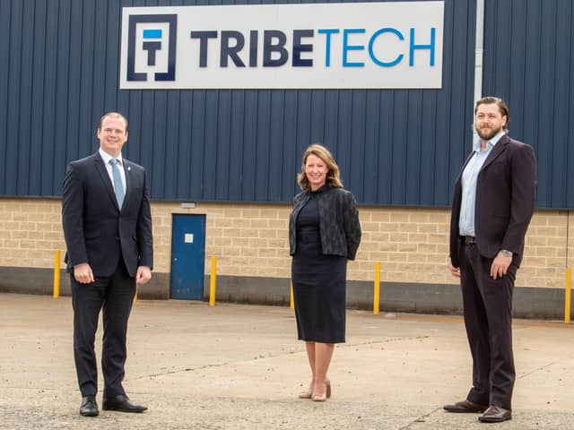 Economy Minister, Gordon Lyons with Charlie King, managing director of Tribe Technology and Anne Beggs, director of Trade and Investment for Invest NI.