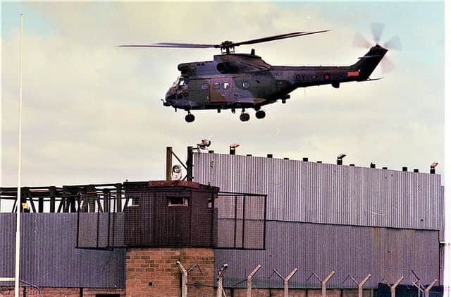 An army helicopter lands in Crossmaglen in 2000. Now the  village has more terrorism displays than it ever had