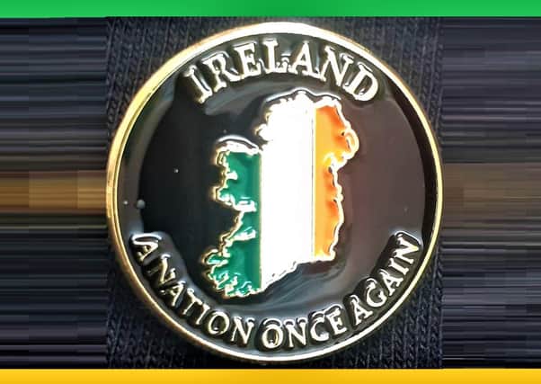 An Irish unity badge sold by Sinn Fein