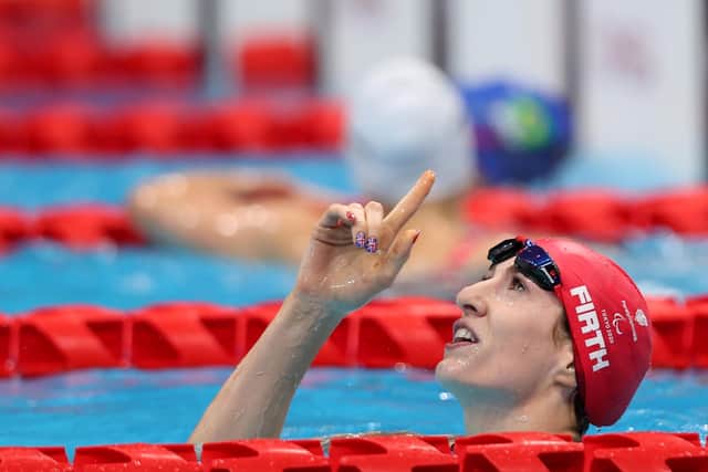 Bethany Firth of Team Great Britain reacts after winning the gold medal during the women's 100m Backstroke - S14 final on day 9 of the Tokyo 2020 Paralympic Games at Tokyo Aquatics Centre. (Photo by Naomi Baker/Getty Images).