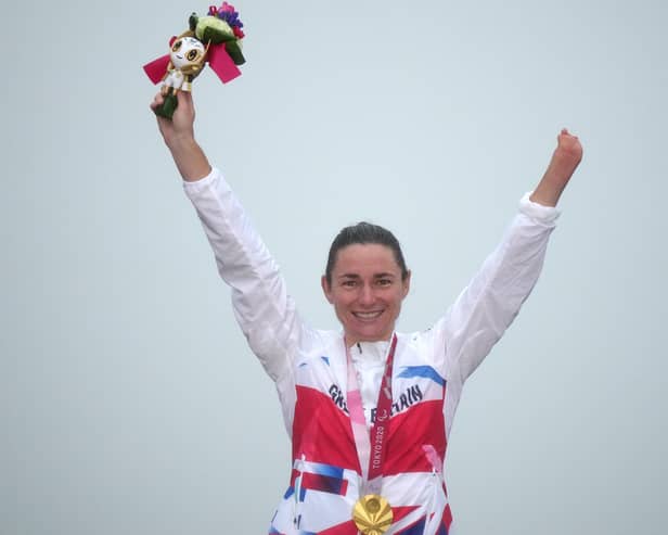 Great Britain's Sarah Storey celebrates winning the gold medal in the Women's C4-5 Road Race at the Fuji International Speedway
