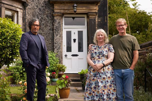 David Olusoga in front of Grosvenor Mount House, with owners Jackie and Pete