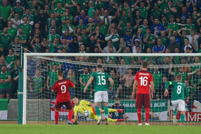 Northern Ireland's Bailey Peacock-Farrell makes a penalty save from Haris Seferovic of Switzerlandduring the scoreless draw in Belfast. Pic by PressEye Ltd.