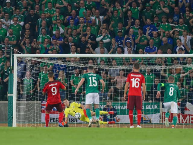 Northern Ireland's Bailey Peacock-Farrell makes a penalty save from Haris Seferovic of Switzerland

during the scoreless draw in Belfast. Pic by PressEye Ltd.