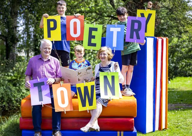 At the launch of Poetry Town, are Michael and Kathleen O'Loughlin with their grandchildren , Billy Byrne  (11), Aidan Byrne  (10) and Conor Byrne  (7).