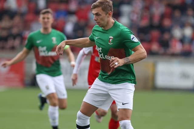 Glentoran's Robbie McDaid is determined to extend Glentoran's strong run of home results tonight against Ballymena United. Pic by Pacemaker.