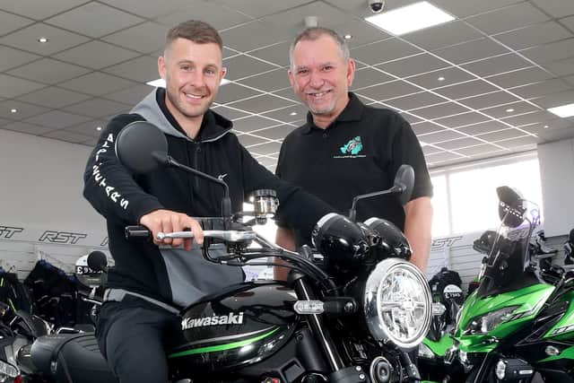 Stephen Mills pictured with Jonathan Rea at the handover of Jonathan's new bike from Coleraine Kawasaki
