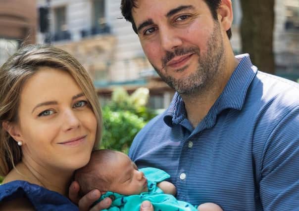 Jonathan Egan with his wife Audrey, 34, and their 11 week old son Dean Michael