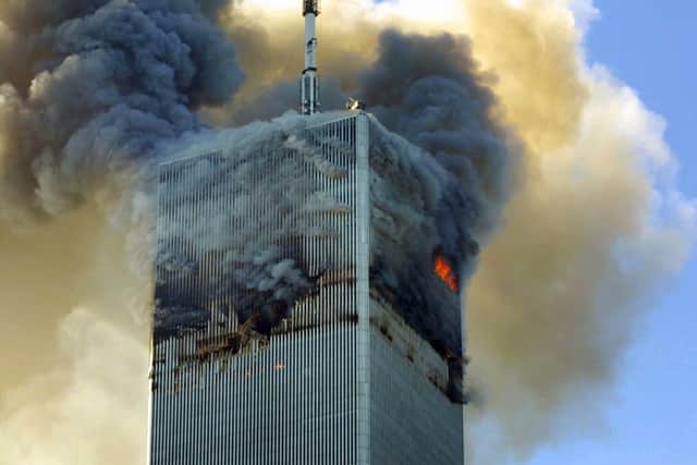 The north tower of the World Trade Center ablaze and engulfed in smoke on Septemer 11, 2001. The worst terrorism seeks not just to kill, but literally to instil a sense of terror  (AP Photo)