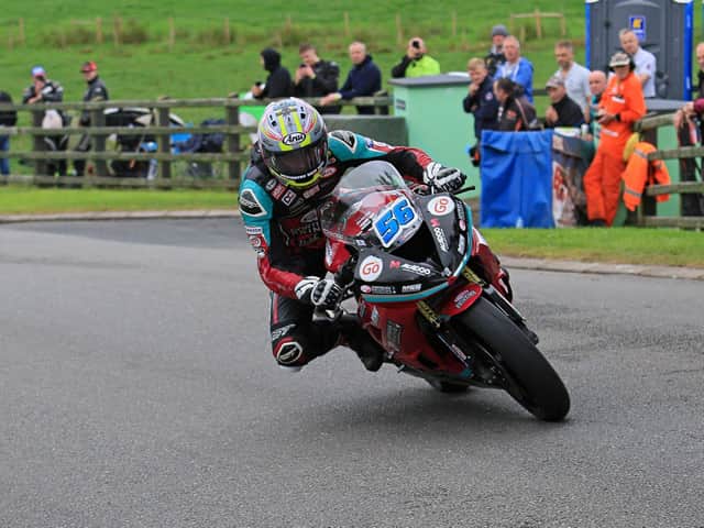 Adam McLean won the Supersport race at the Cookstown 100 on the McAdoo Kawasaki.