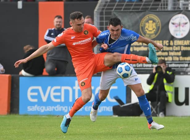 Lee McNulty (left) pictured in action for Carrick Rangers against Coleraine