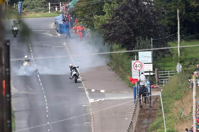 Paul Jordan looks back as Darryl Tweed narrowly avoids colliding with Michael Sweeney's Yamaha after the Republic of Ireland rider crashed out of the Supersprot race at the KDM Hire Cookstown 100 on Saturday. Picture: Stephen Davison/Pacemaker Press.