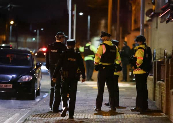 Police patrolling the Holylands area of south Belfast on St Patrick's Day, 2021