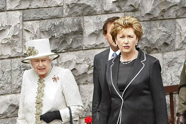 Queen Elizabeth II and Irish President Mary McAleese arrive at the Garden of Remembrance where they laid wreaths to honour the dead in May 2011.