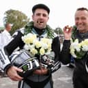 Goodwood winners Michael Dunlop and Steve Plater celebrate with a cigar after winning the first leg on the Barry Sheene Trophy on Saturday. Picture: Stephen Davison/Pacemaker Press.