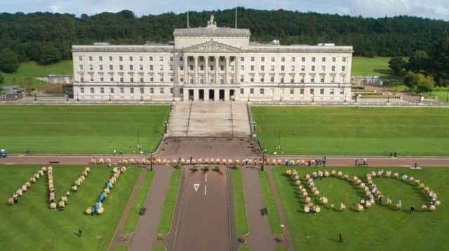 The drummers in formation to spell out a centenary birthday greeting to Northern Ireland