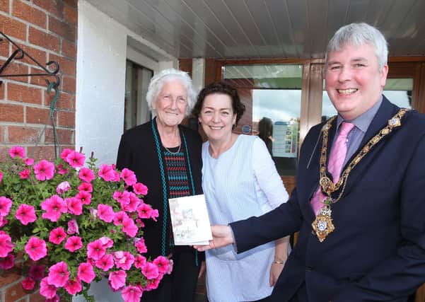 Maisie Allison at Abbeyfield House, Ballymoney with her carer Jen Ann Blair and Mayor Richard Holmes, ahead of her 103rd birthday today. Pic: Kevin McAuley