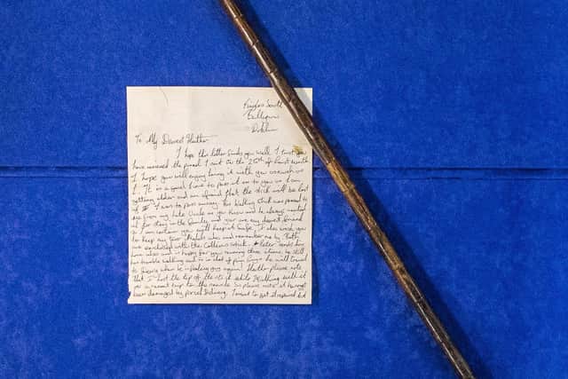 Walking stick once belonging to Michael Collins with letter of providence, one of the lots for sale at Bloomfield Auctions in east Belfast next week. Picture date: Monday September 20, 2021.