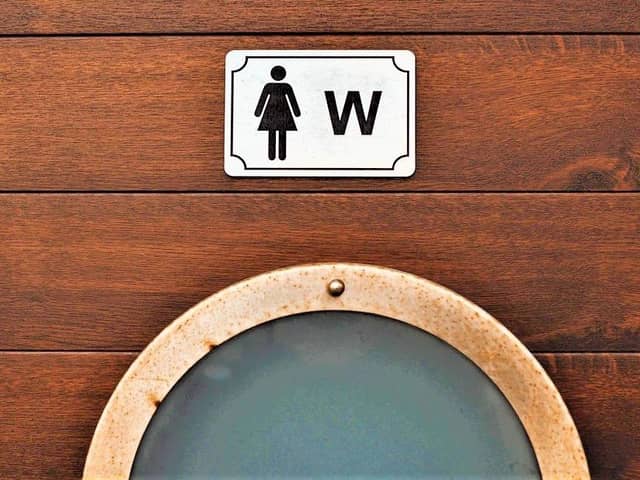 'Women Bathroom sign' by W uestenigel