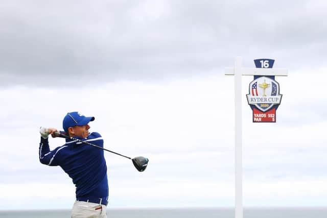Rory McIlroy of team Europe plays his shot from the 16th tee prior to the 43rd Ryder Cup at Whistling Straits