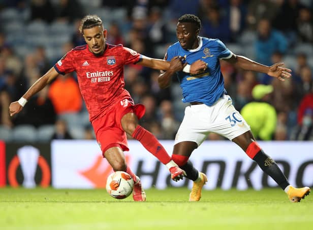 Rangers striker  Fashion Sakala in action against Lyon