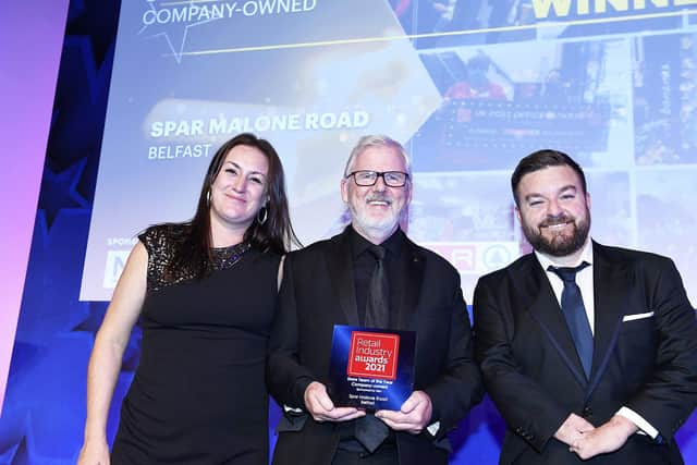 Kim Reddick, commercial director of the Retail Industry Awards presents the award for Store Team of the Year (company owned) to Paddy Doody from Henderson Group for Spar Malone. The independent Store Team of the Year award was taken home by Mulkerns Eurospar Newry. Also pictured is host, Alex Brooker