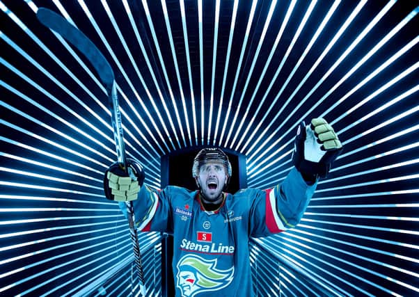 Belfast Giants Scott Conway celebrating the new brand and jersey for the news season