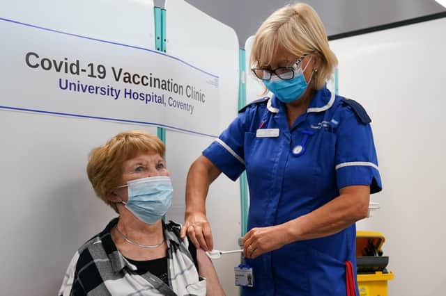 Margaret Keenan, the first person to receive the coronavirus vaccine in December last year, receives her booster jab at University Hospital Coventry, Warwickshire on September 24, 2021. Photo: Jacob King/PA Wire