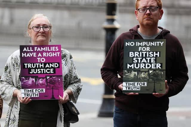 People attend a Time for Truth day of action at the memorial for the victims of the Dublin and Monaghan bombings on Talbot street, Dublin. Photo: Brian Lawless/PA Wire
