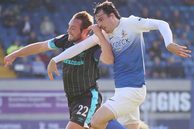 Linfield's Jamie Mulgrew (left) battling in Lurgan with Danny Wallace of Glenavon. Pic by Pacemaker.