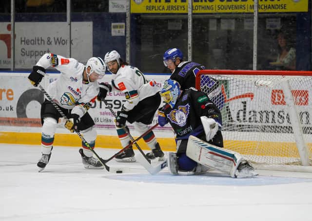 Slater Doggett and Jordan Boucher in action for Belfast Giants against Fife Flyers at the Fife Ice Arena in Kirkcaldy. Both Doggett and Boucher scored their first goals in teal, contributing to a 5-1 win over Fife Flyers at the Fife Ice Arena in Kirkcaldy the Giants’ second away win of the weekend.. Picture credit: Fife Flyers Images/EIHL