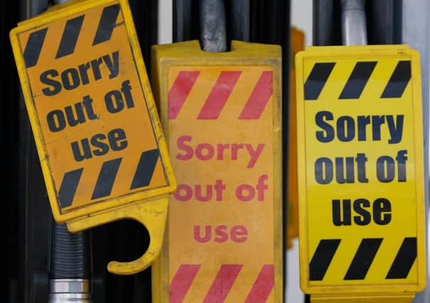 A sign on fuel pumps showing no fuel available at a BP petrol station in Grangemouth. Picture date: Monday September 27, 2021.