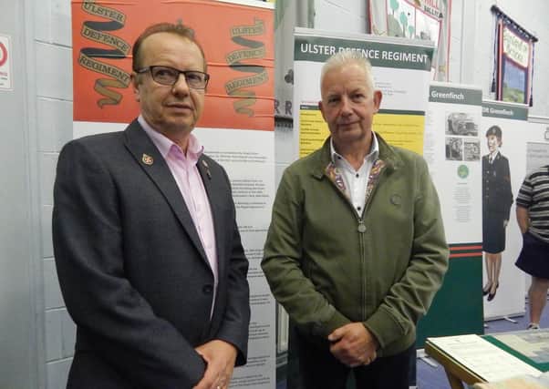 Mitch Bresland, guest speaker at a talk on the UDR in Ballycarry Community Centre, with the chairman of the community group, Billy Thompson.