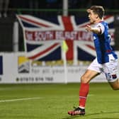 Cameron Palmer scores Linfield's third goal against Glentoran at The Oval.