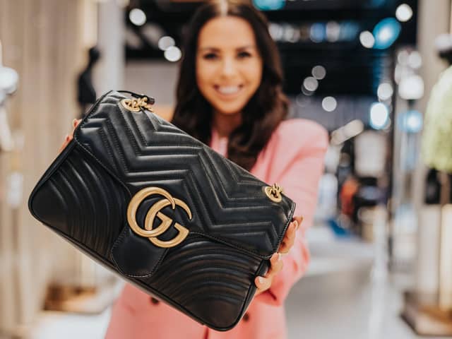 Cancer Focus NI ambassador and Cool FM DJ Rebecca McKinney with the super expensive Gucci handbag now available to be won. Enter the competition without delay