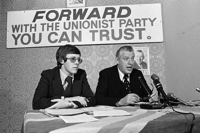 The then DUP general secretary Peter Robinson and leader Rev Ian Paisley in the late 1970s, at what was at the time the DUP headquarters on the Albertbridge Road in Belfast. The party was founded by Dr Paisley several years earlier, on September 30 1971. Picture Pacemaker