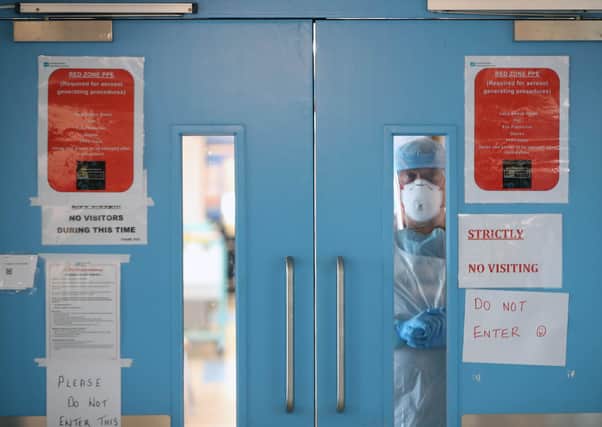 PABest PABest Infection Control nurse Colin Clarke looks out from a Covid-19 recovery ward at Craigavon Area Hospital in Co Armagh, Northern Ireland.