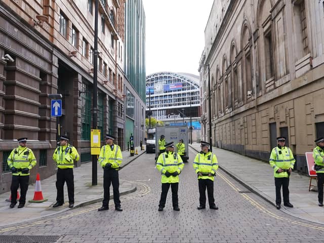 Tight security outside the Manchester Central Convention Complex during the Conservative Party Conference in Manchester yesterday. Today's debate involving the Northern Ireland unionist leaders will take place outside but near to this main conference zone. Photo: Stefan Rousseau/PA Wire