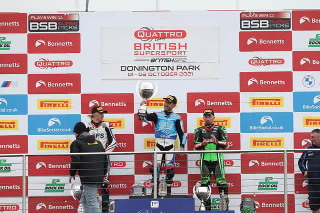 Race winner Lee Johnston on the rostrum at Donington Park with runner-up Scott Swann (left) and Jack Kennedy. Picture: David Yeomans.