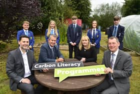 Pupils from Antrim Grammar School and St Benedict’s College, Randalstown, helped launch a new DAERA-funded Carbon Literacy project to help in the fight against climate change. (L-R) Scott Howes, Keep Northern Ireland Beautiful, Environment Minister Edwin Poots, Education Minister Michelle McIlveen and Ian Humphrey, Chief Executive of Keep Northern Ireland Beautiful