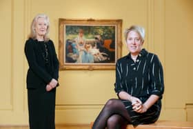 Anne Stewart, senior curator of Art at National Museums NI and Kathryn Thomson, chief executive of National Museums NI with Tissot's Quiet
